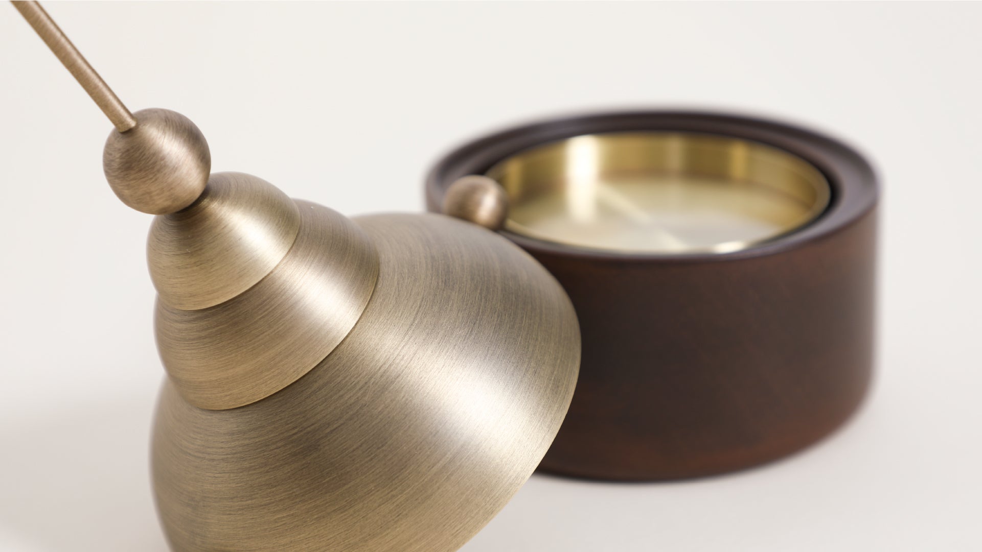 Opened incense, showing the metal of the casing the one where the incense burns