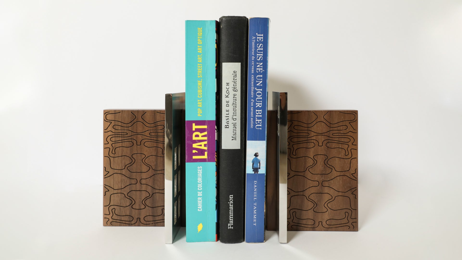 Front view of the Msheireb book holder with book props that display the functionality