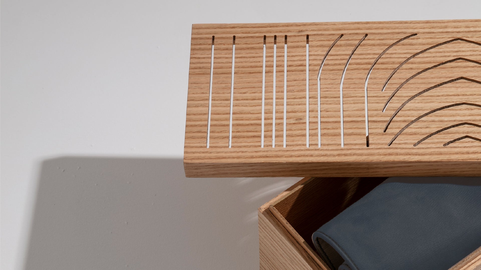 Details on the wooden box that stores the Praying carpet